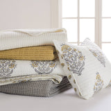 Kamira Ochre Reversible Quilt Set